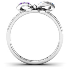 Behind the Bow: Crafting Our Silver Fancy Stone Ring with Love