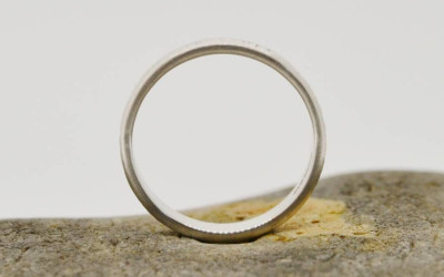 Silver Rippled Wedding Ring: Handcrafted Artistry & Deep Meaning